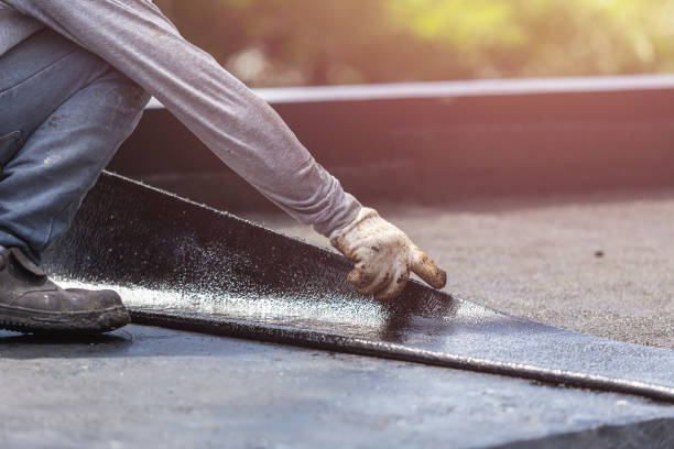 Professional Basement Waterproofing technician working in Etowah, TN